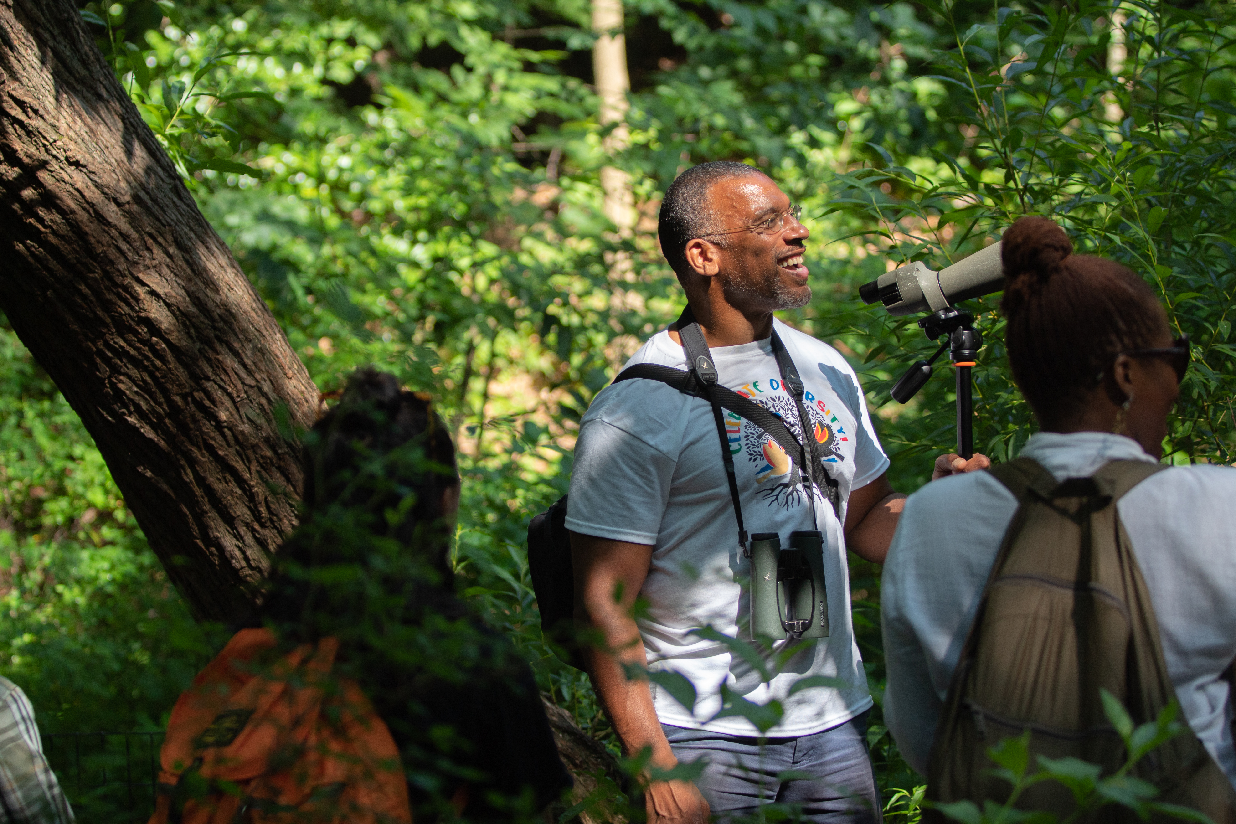 NYC Audubon board member Christian Cooper leads fourth and fifth graders from AmPark Neighborhood School on a bird outing in Van Cortlandt Park. Photo: NYC Audubon