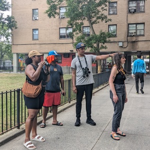 NYCHA in Nature participants bird at the Beach 41st Street NYCHA housing complex